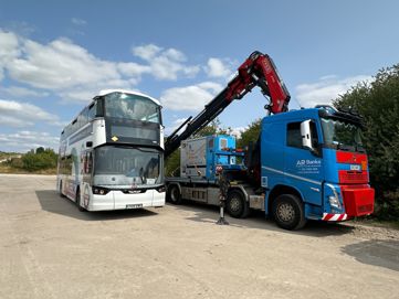 Wrightbus Electroliner being charged at a mobile 'powerskid' provided by Zenobe